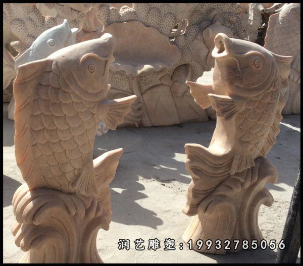 小区晚霞红鱼石雕
