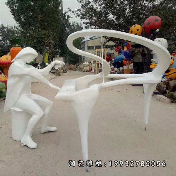 户外玻璃钢弹钢琴人物雕塑